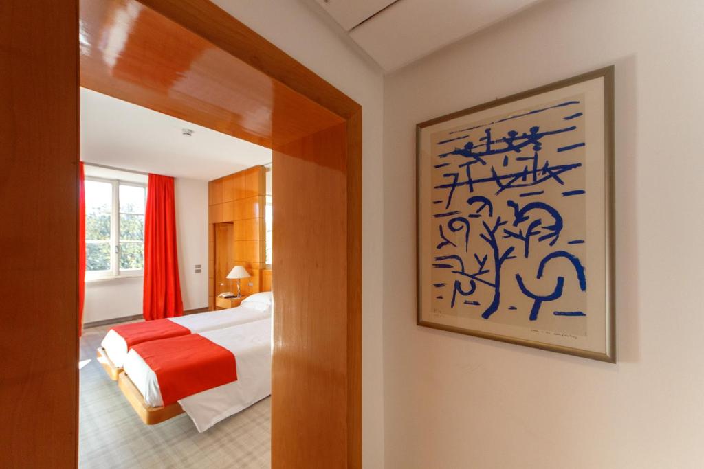 Postel nebo postele na pokoji v ubytování Albani Hotel Roma