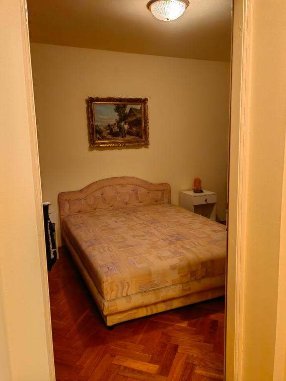 Postel nebo postele na pokoji v ubytování JO.RA. APARTMENT