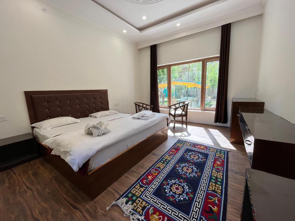 Letto o letti in una camera di Chubi Sponbo