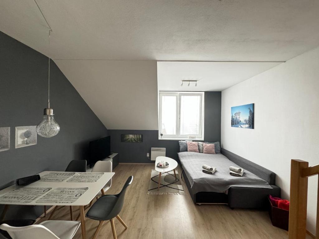 Postel nebo postele na pokoji v ubytování Dolní Morava - Apartmány
