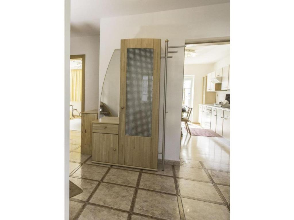 a wooden door in a room with a kitchen at Bernhard Schmidt-Gasse in Gmunden