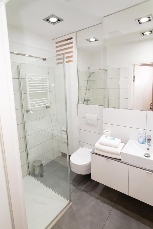 Kúpeľňa v ubytovaní Triton Apartments