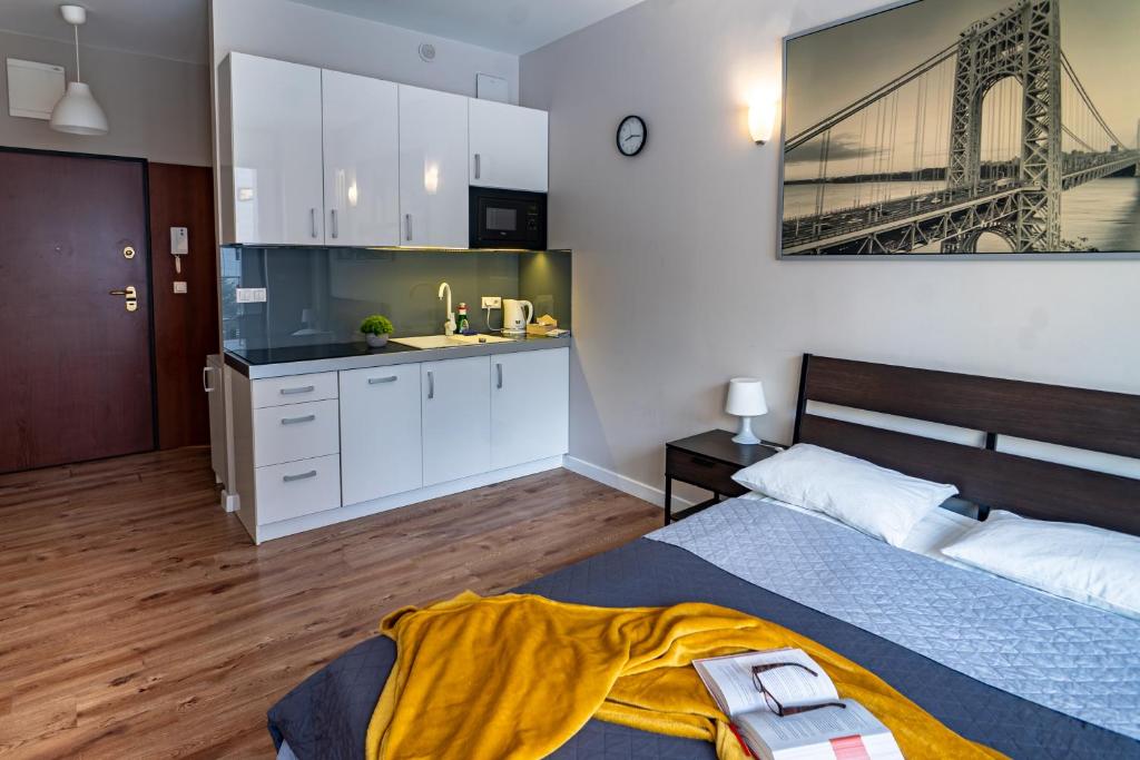 Posteľ alebo postele v izbe v ubytovaní Triton Apartments