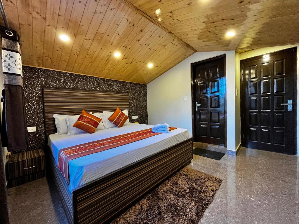 Postel nebo postele na pokoji v ubytování Puri's BnB