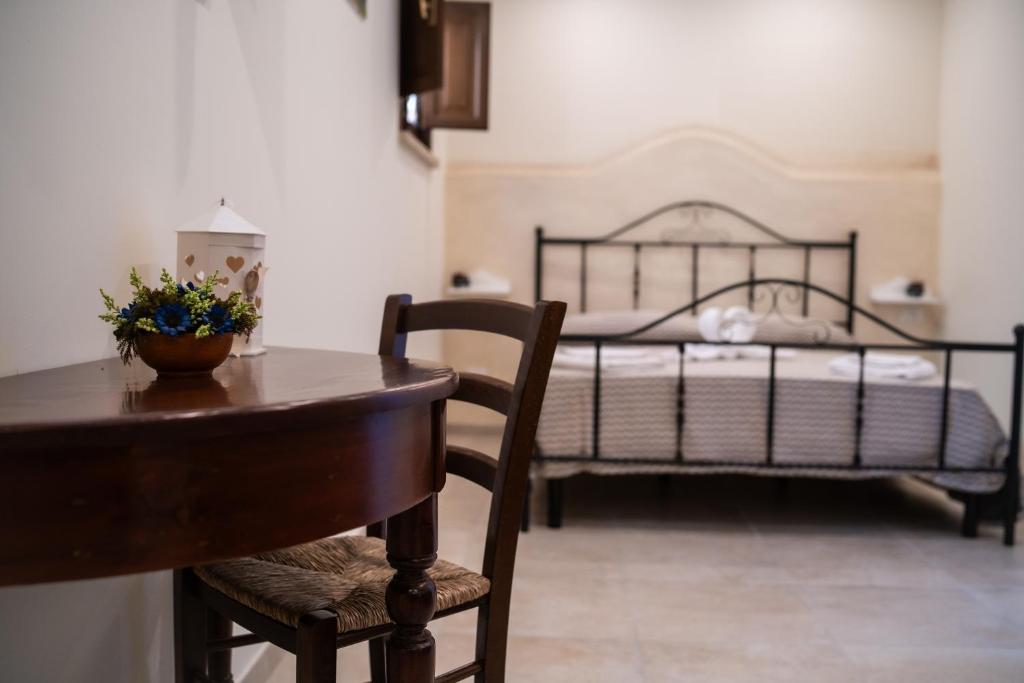 Postel nebo postele na pokoji v ubytování B&B La Dimora di Pepè