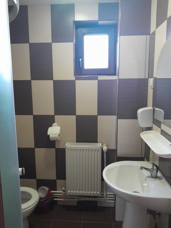 Koupelna v ubytování Apartamente Ambrus Praid