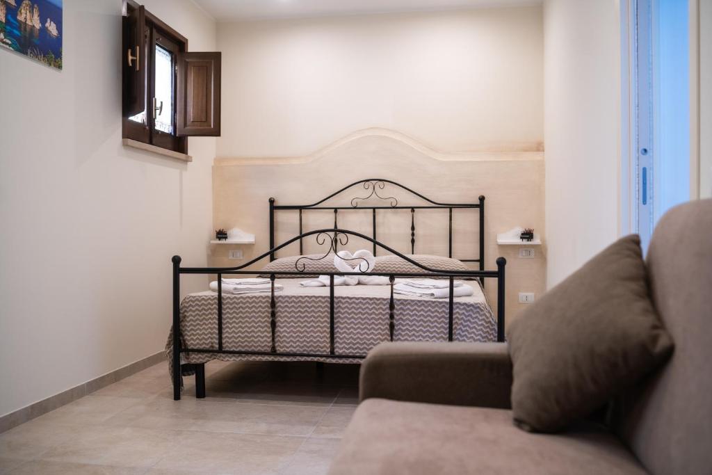 Postel nebo postele na pokoji v ubytování B&B La Dimora di Pepè