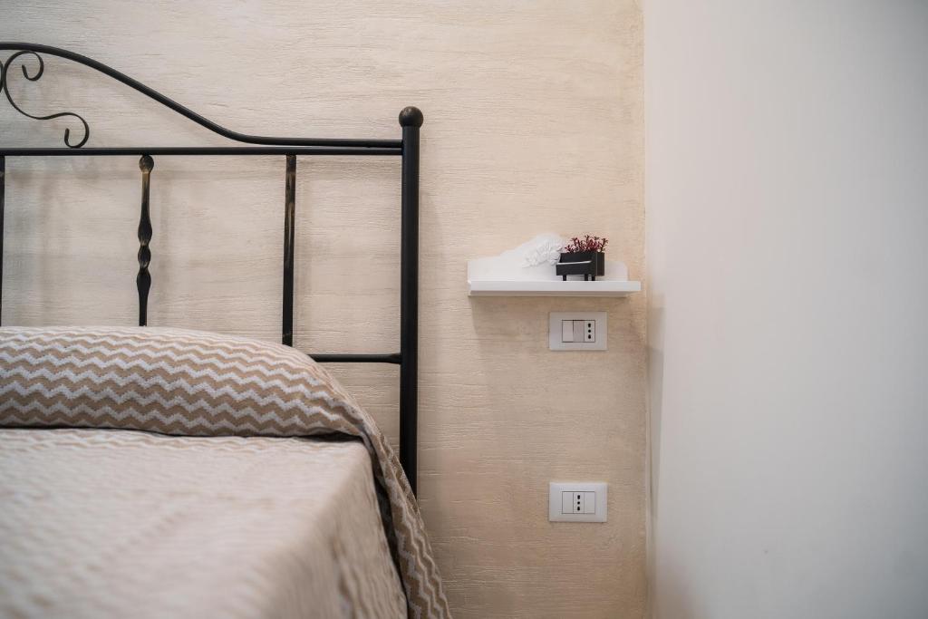 Postel nebo postele na pokoji v ubytování B&B La Dimora di Pepè