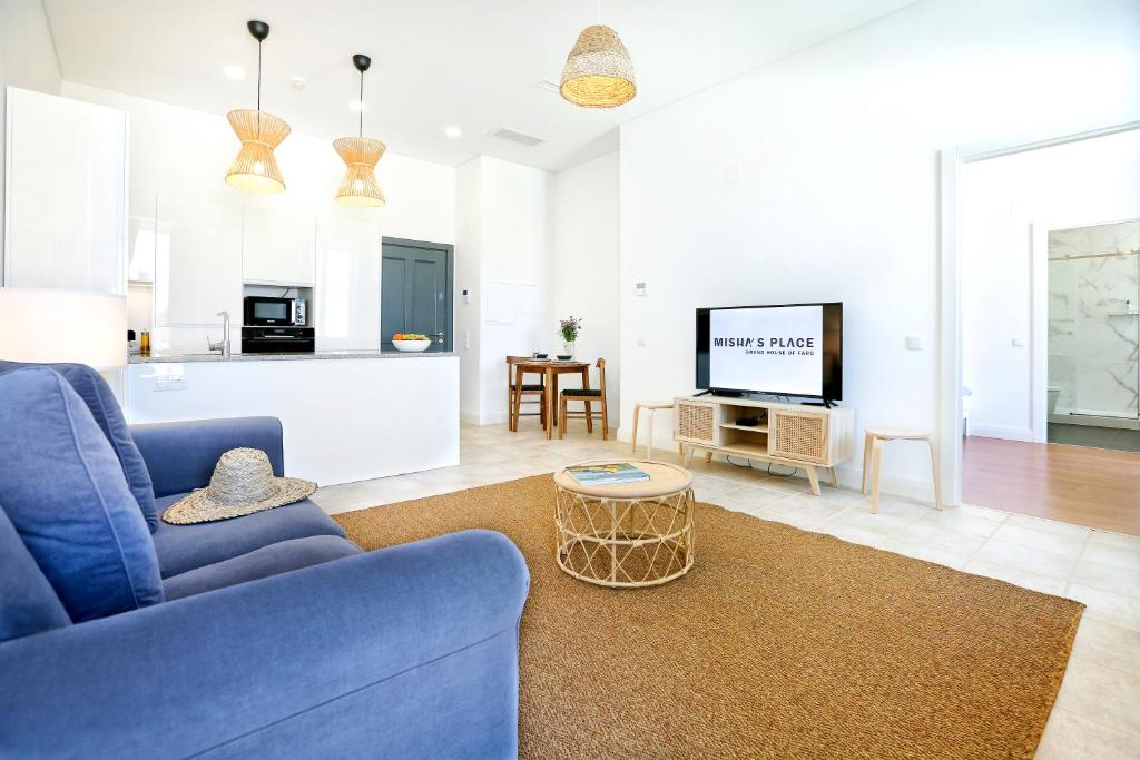 Kuchyň nebo kuchyňský kout v ubytování Lovely Faro Apartment