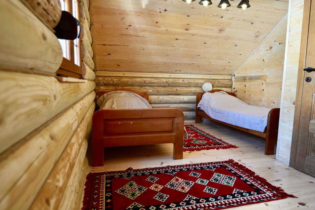 Postel nebo postele na pokoji v ubytování Cottage Dzudovic 2 Vikendica Džudović 2