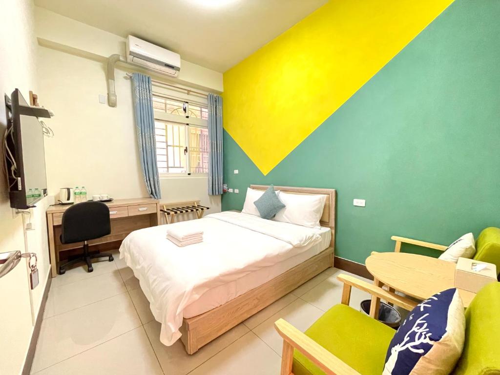 Postel nebo postele na pokoji v ubytování Banshan Yunxiu Homestay