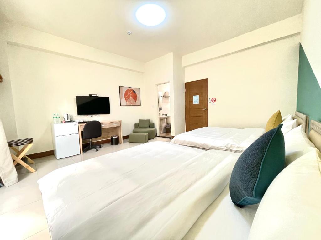 Postel nebo postele na pokoji v ubytování Banshan Yunxiu Homestay