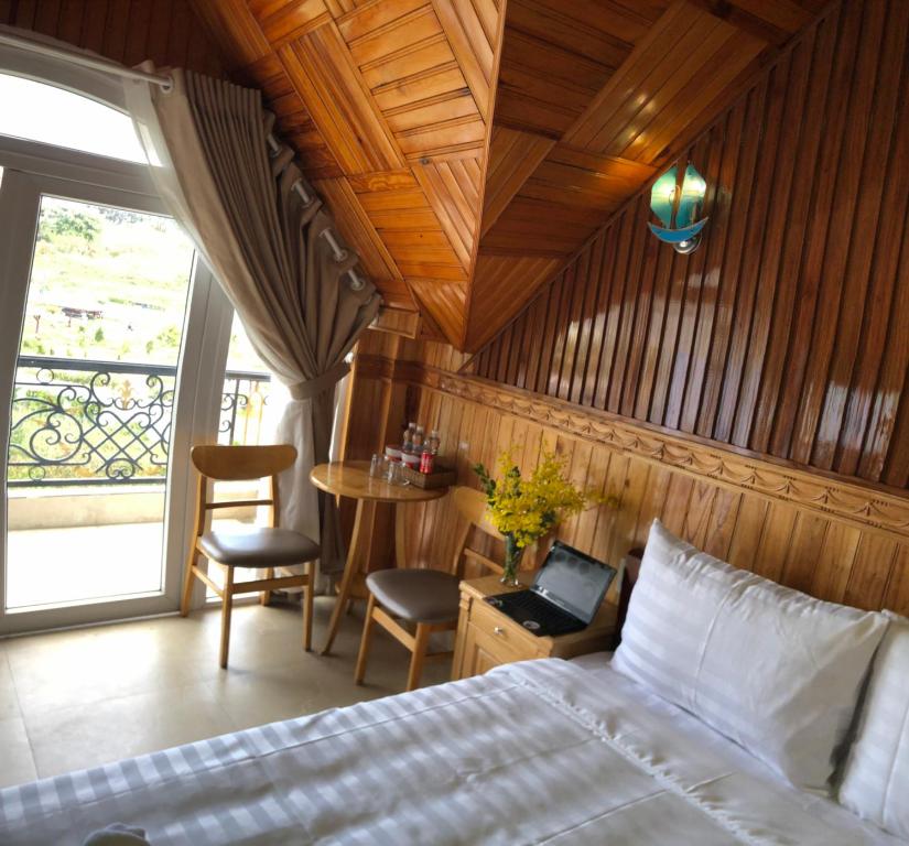 Postel nebo postele na pokoji v ubytování KHÁNH AN HOTEL
