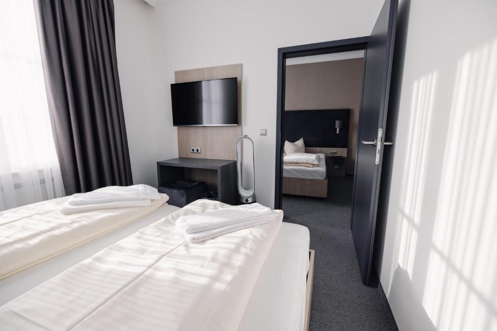 Postel nebo postele na pokoji v ubytování N9 Hotels