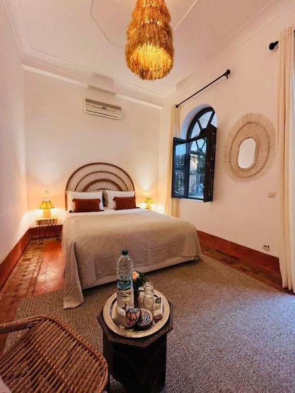 Postel nebo postele na pokoji v ubytování Riad Bamaga