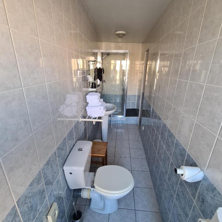 Koupelna v ubytování Le Grand Hotel