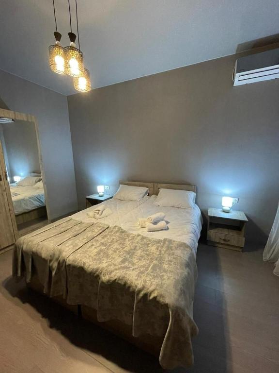 Postel nebo postele na pokoji v ubytování Hotel Lumi