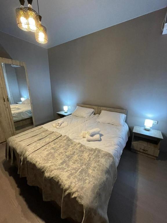 Postel nebo postele na pokoji v ubytování Hotel Lumi