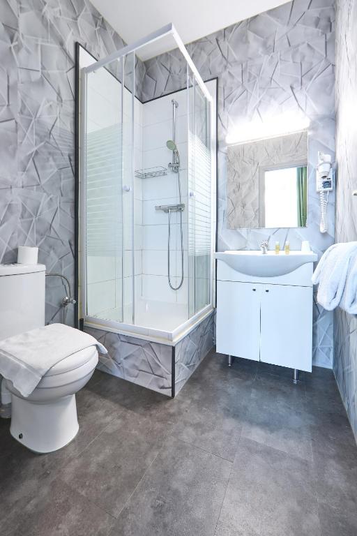 Koupelna v ubytování Hotel Derby MERODE