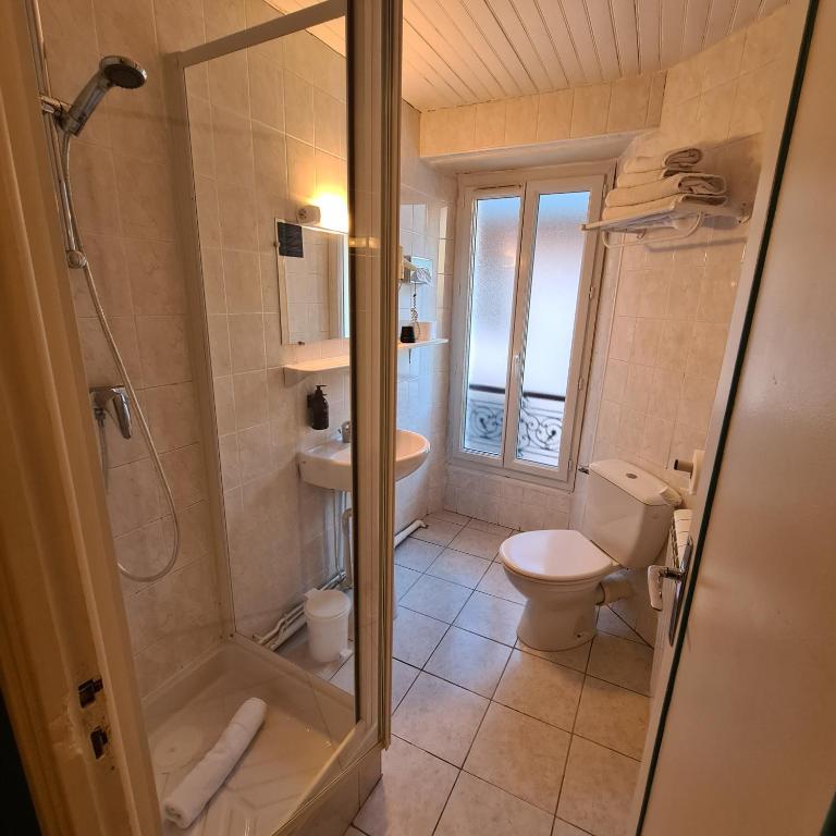 Koupelna v ubytování Le Grand Hotel