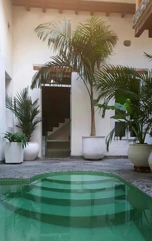 Bazén v ubytování Casa Verde Hotel nebo v jeho okolí