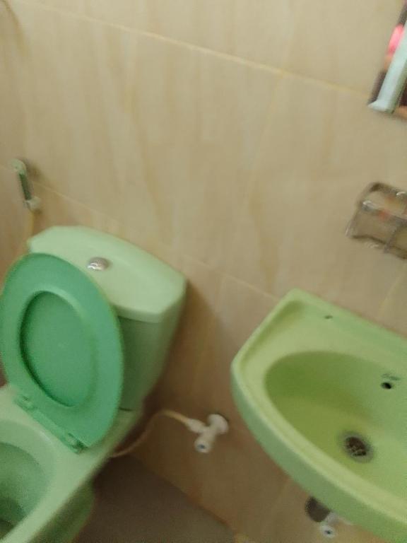 Koupelna v ubytování Serene Inn Kandana