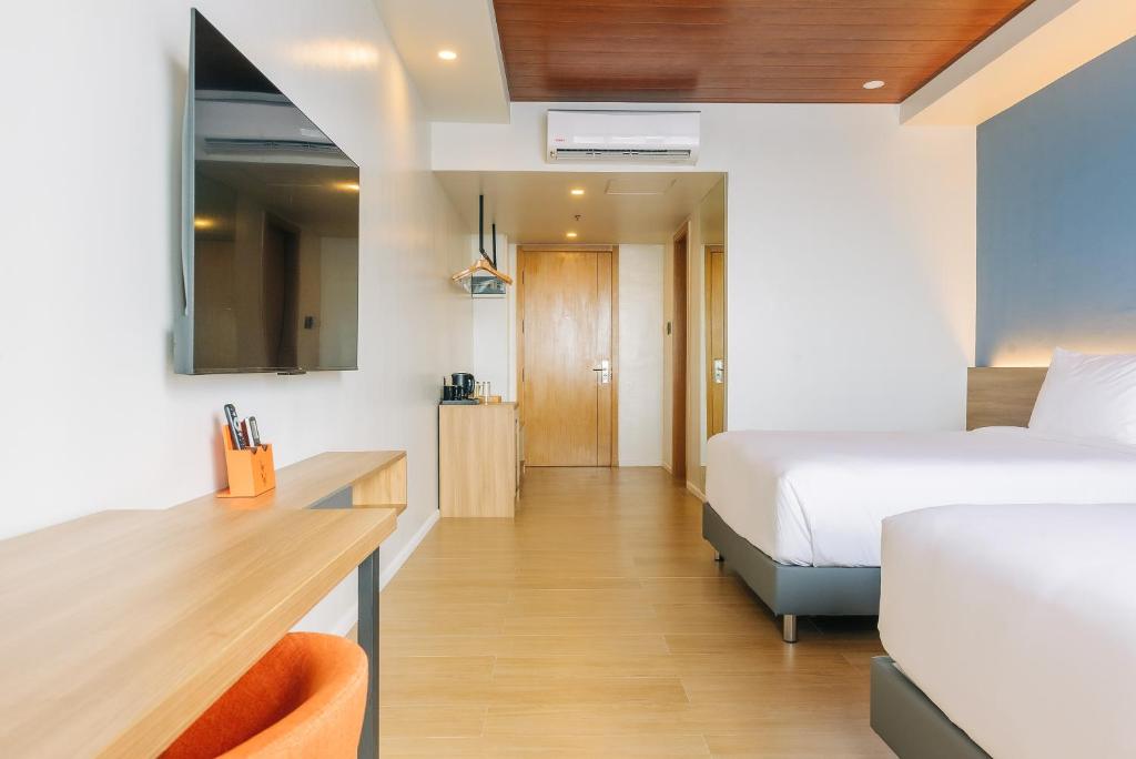 Postel nebo postele na pokoji v ubytování Levo Hotel