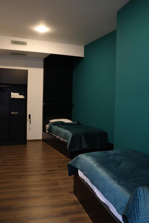 Postel nebo postele na pokoji v ubytování Prior Hotel
