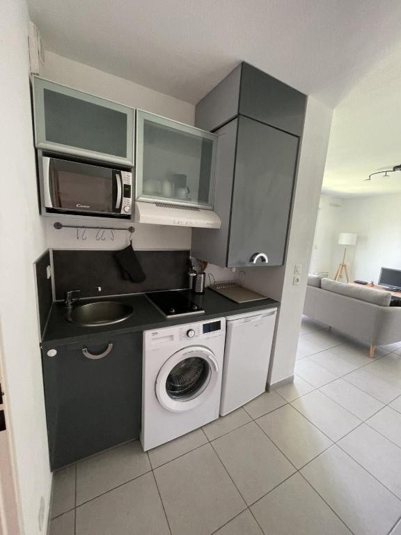 A cozinha ou cozinha compacta de Le Galine- Terrace air conditioning and parking!