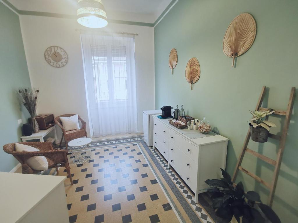A seating area at AZZURRA Ridi Che Ti Passa