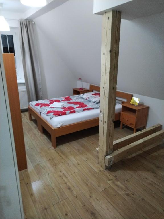 Postel nebo postele na pokoji v ubytování Lipanka