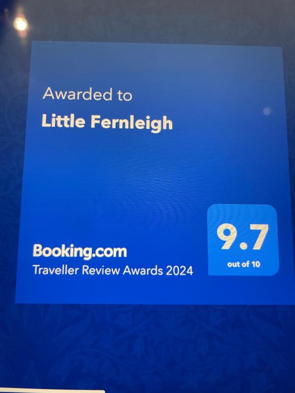 a screenshot of a cell phone with the text upgraded to little feminism at Little Fernleigh in Perranporth