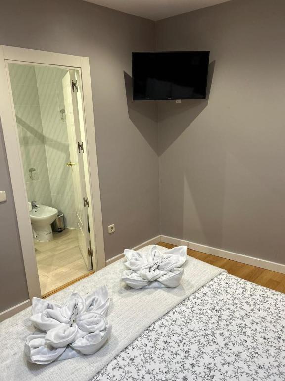 Postel nebo postele na pokoji v ubytování Hostal New Dream Madrid