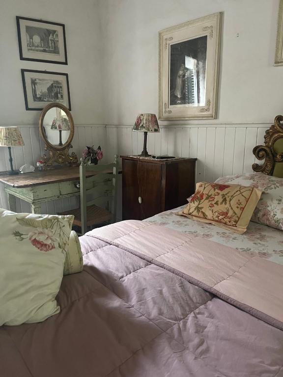 A bed or beds in a room at B&B Alla Corte dei Medici