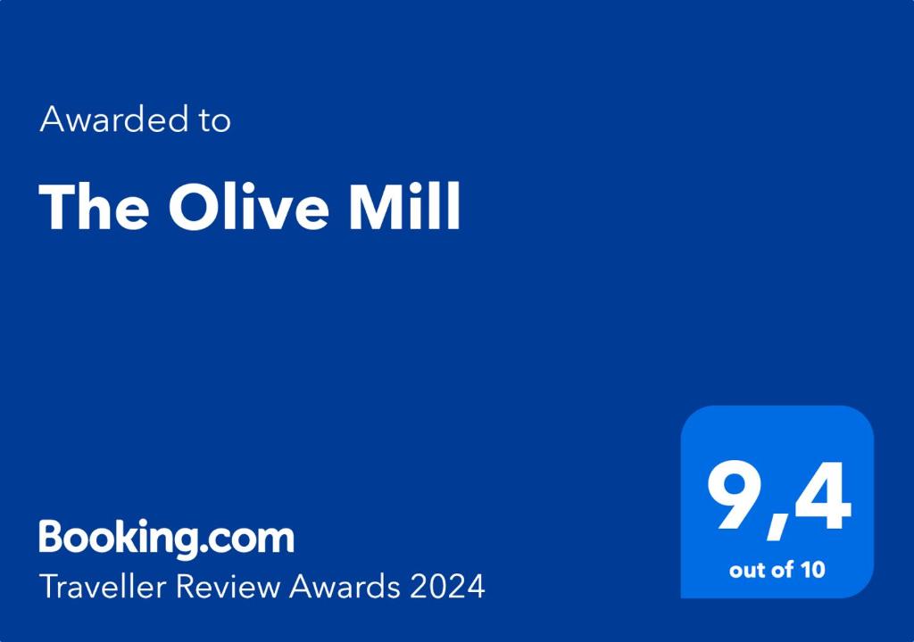 um quadrado azul com o texto atribuído ao moinho online em The Olive Mill em La Murada