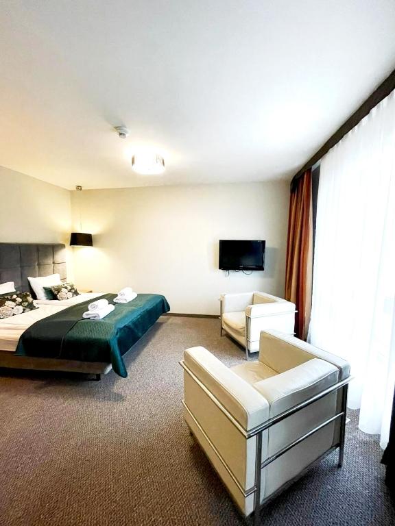 Posteľ alebo postele v izbe v ubytovaní 316 w ROYAL TULIP SAND 200 m do plaży DOBRUK APARTAMENTY
