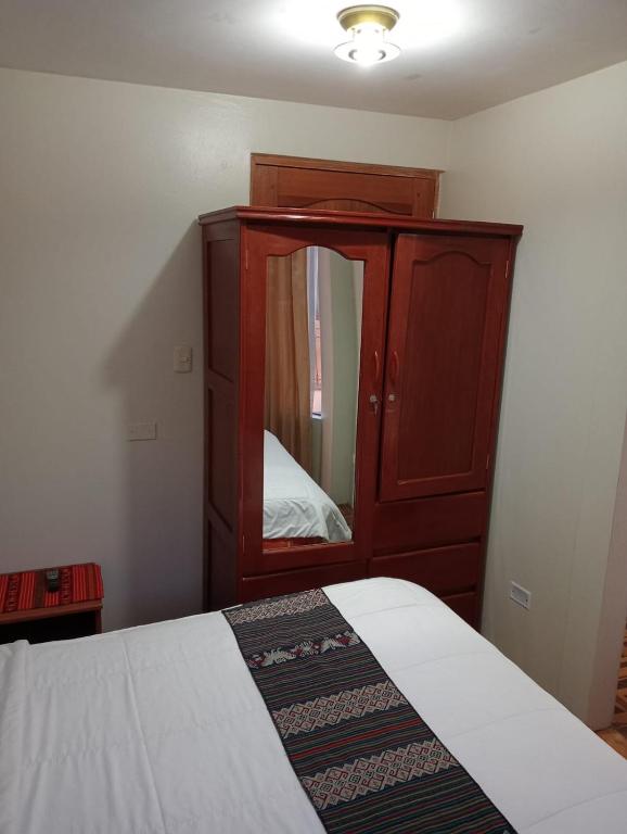Postel nebo postele na pokoji v ubytování Posada de Mama