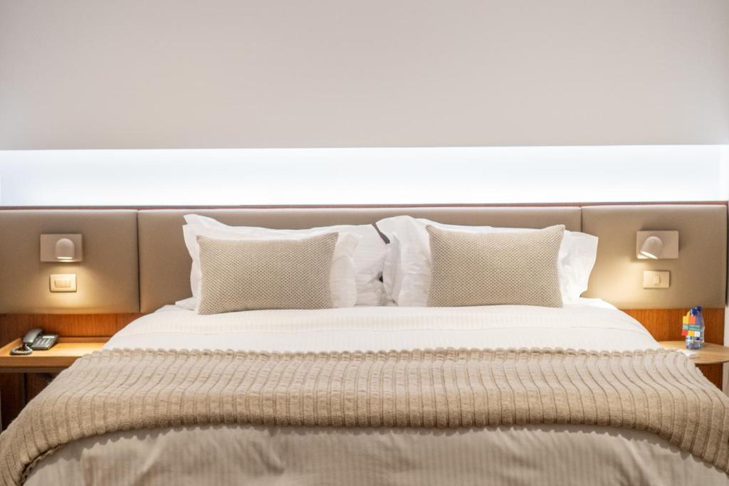 Cama ou camas em um quarto em Quality Hotel Pampulha & Convention Center