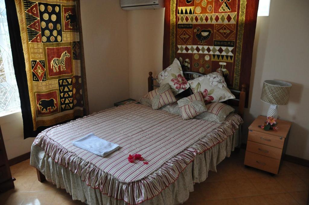 Postel nebo postele na pokoji v ubytování Le Refuge