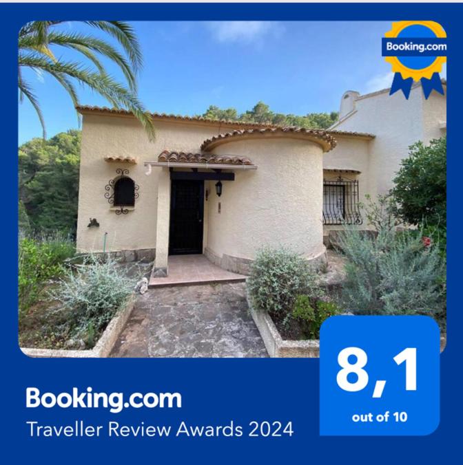 a picture of a house with a sign that says travel review awards at Villa Cayetana in Jávea