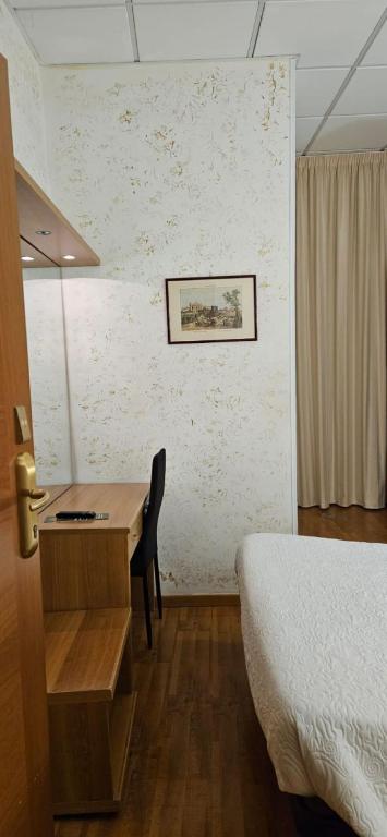 Ліжко або ліжка в номері Hotel Julia
