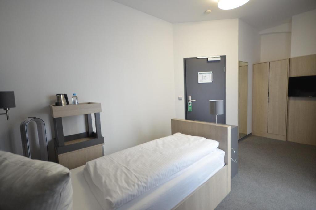 Postel nebo postele na pokoji v ubytování N9 Hotels
