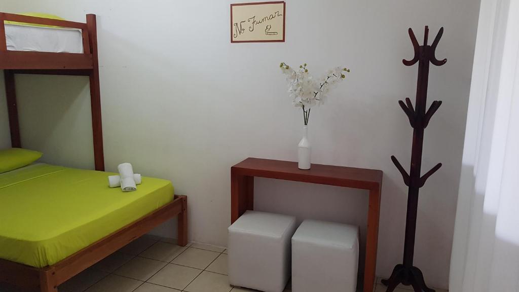 Postel nebo postele na pokoji v ubytování Riveri Salinas BY CHAQANA