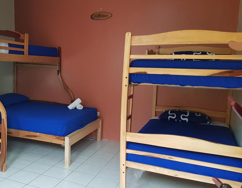 Postel nebo postele na pokoji v ubytování Riveri Salinas BY CHAQANA