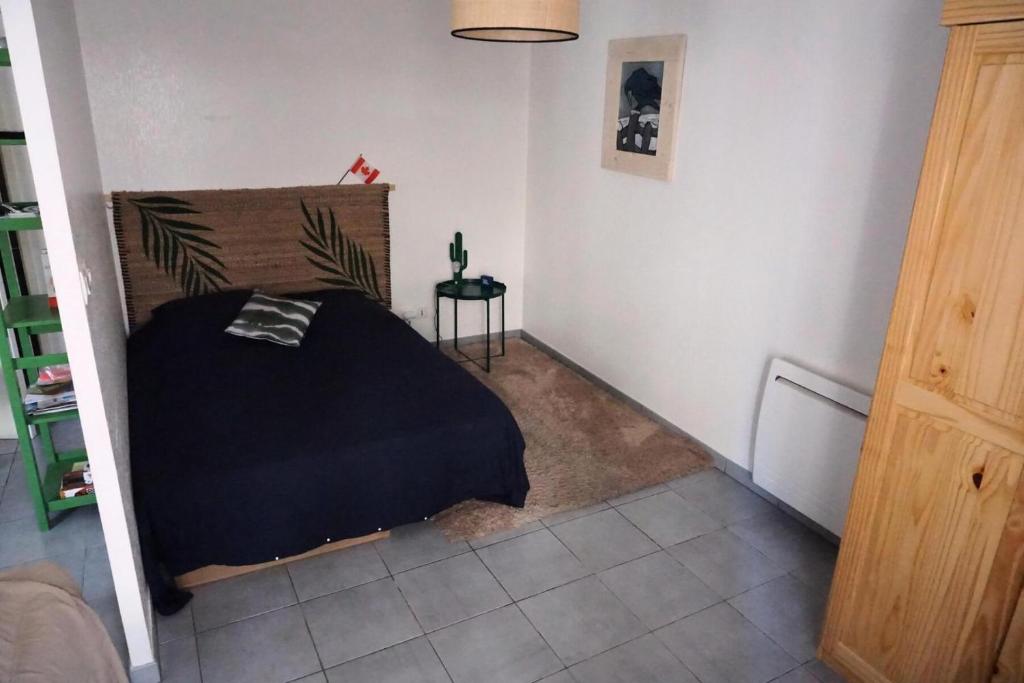 Posteľ alebo postele v izbe v ubytovaní Residence Amaryllis - Agréable logement au coeur de la ville ! MAE-8144