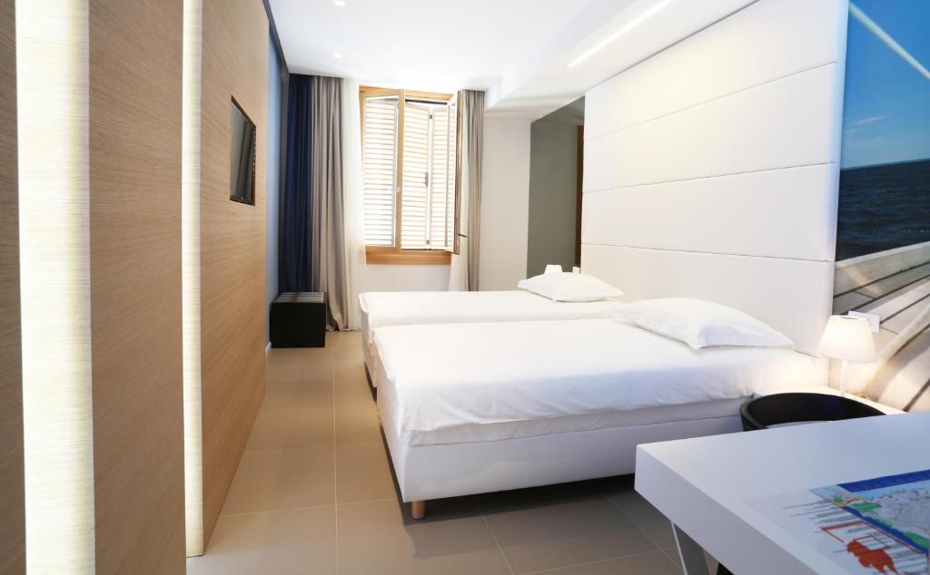 Postel nebo postele na pokoji v ubytování Guesthouse Villa Scalaria