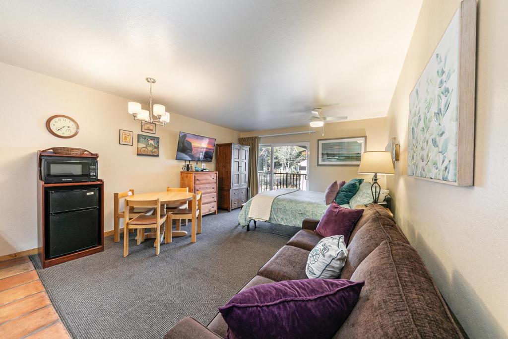 a living room with a couch and a bedroom at Studio 2nd Floor Unit 217 Bldg B in Truckee