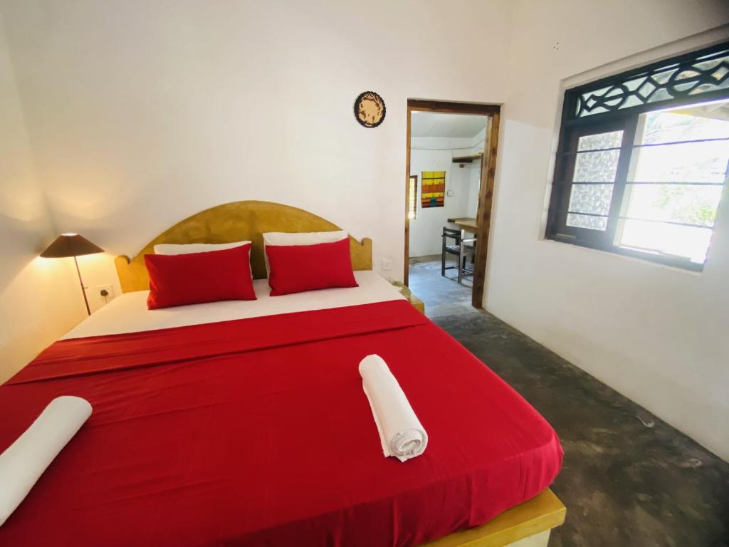 Postel nebo postele na pokoji v ubytování Harmony Beach Hotel