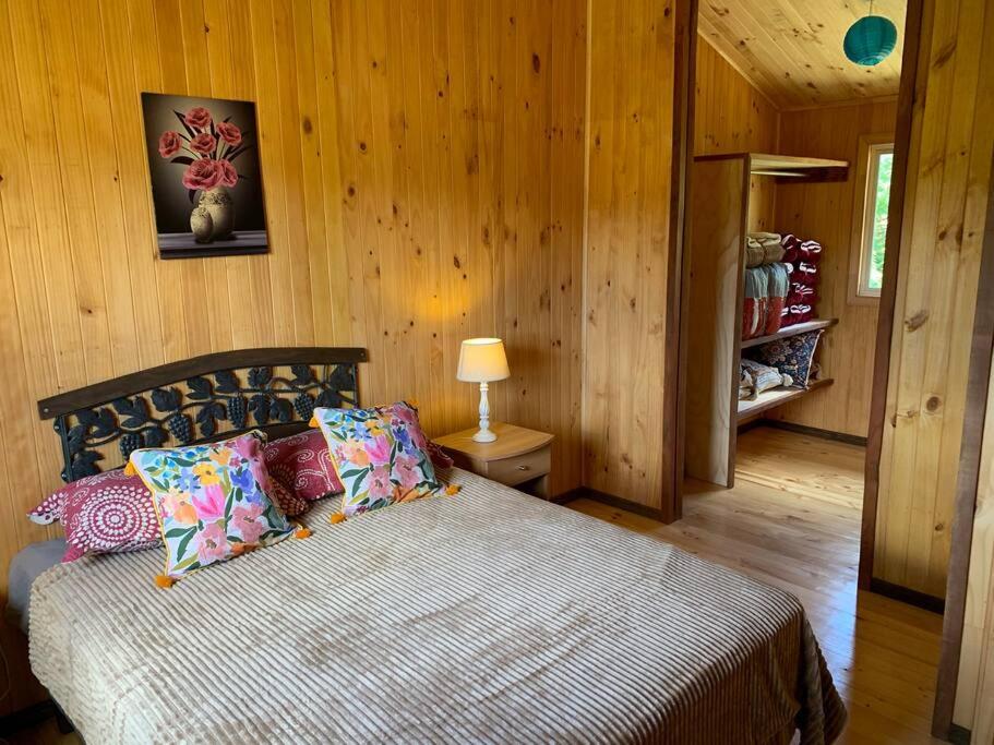 Posteľ alebo postele v izbe v ubytovaní Cabaña laurel lago panguipulli