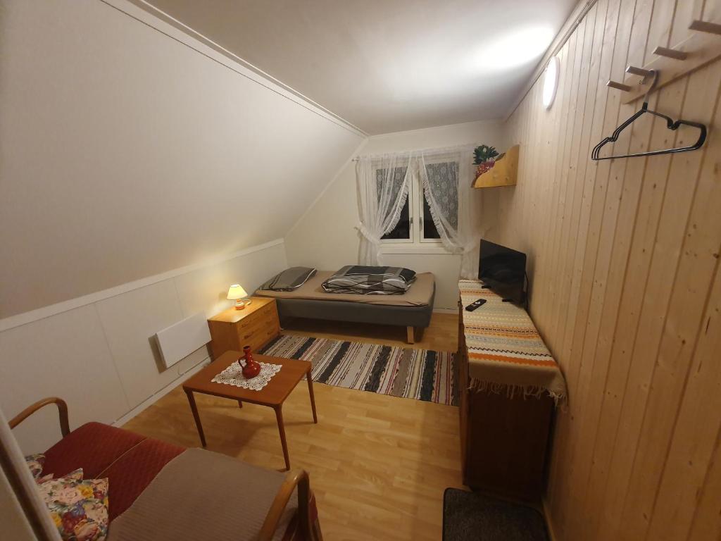 Postel nebo postele na pokoji v ubytování Overnatting Rodal